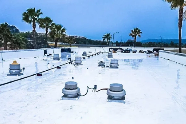 Commercial roofing installation on flat roof in San Diego with single-ply membrane system